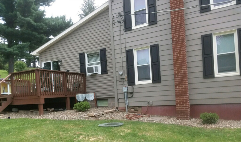 Newly installed grinder pump at a home in the Village of Kelly Crossroads