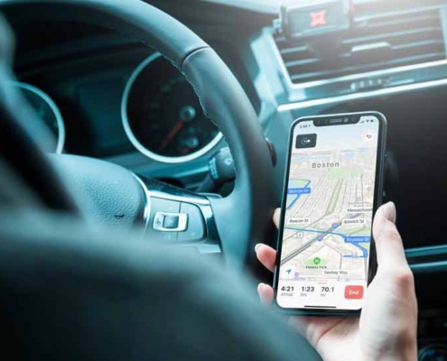 driver looking at navigational app on phone