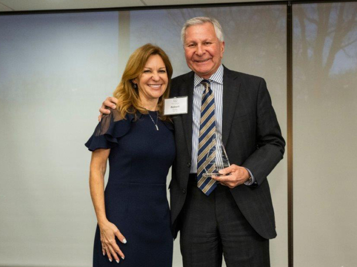 Bob Grubic accepts a Professional Achievement Award from Dr. Michele Marcolongo, the Dean of the College of Engineering at Villanova.