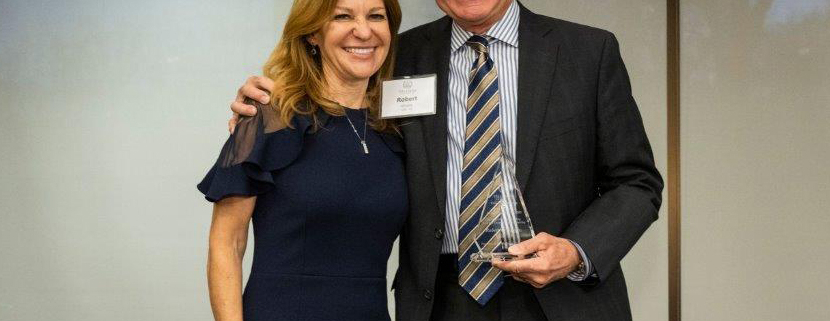 Bob Grubic accepts a Professional Achievement Award from Dr. Michele Marcolongo, the Dean of the College of Engineering at Villanova.