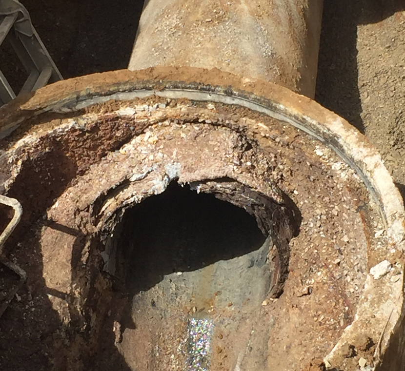 Badly corroded manhole