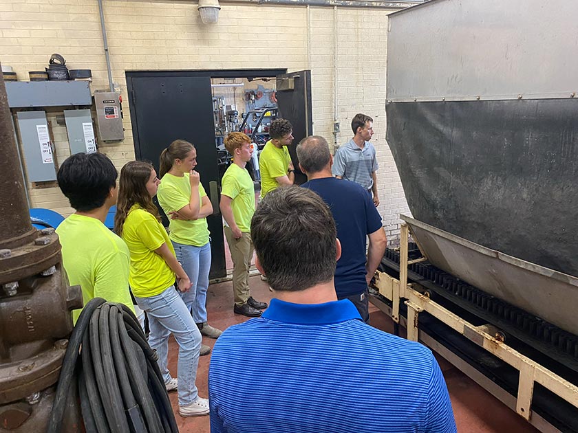 Interns and entry-level staff visit a wastewater treatment plant to learn more about design in operation