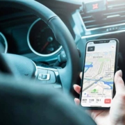 driver looking at navigational app on phone
