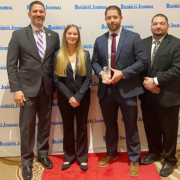 Shawn Fabian with Silver Spring Township's Jennifer Groller, Carl Machamer, and Scott Maldonado at the Central Penn Business Journal Top Projects Award ceremony