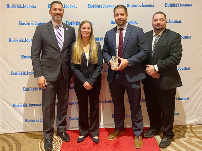 Shawn Fabian with Silver Spring Township's Jennifer Groller, Carl Machamer, and Scott Maldonado at the Central Penn Business Journal Top Projects Award ceremony