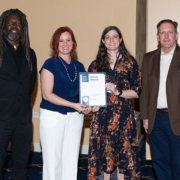 Tracy Strickland and Jennie Ryan-Gisewhite accept the Honor Award for Analysis & Planning for the Ridgway Riverfront Master Plan