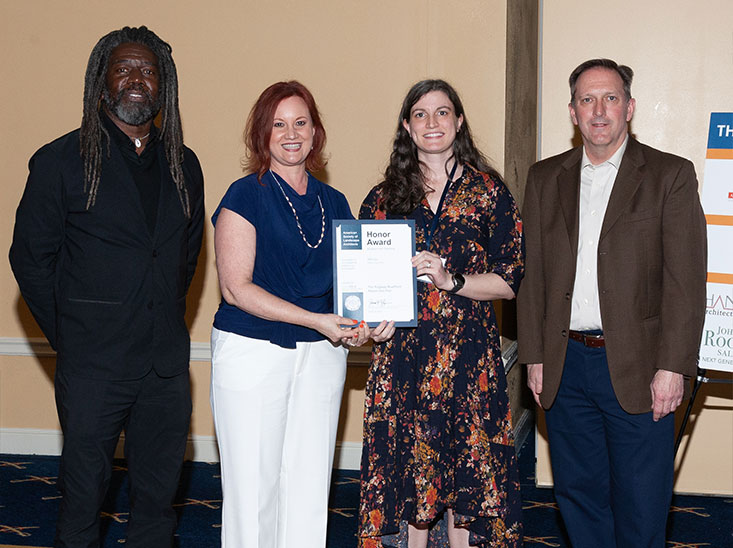Tracy Strickland and Jennie Ryan-Gisewhite accept the Honor Award for Analysis & Planning for the Ridgway Riverfront Master Plan